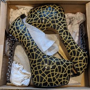 Brand new sequin gold and black platform heels.